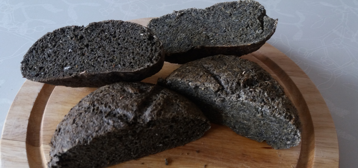 pieces of baguette-like black bread